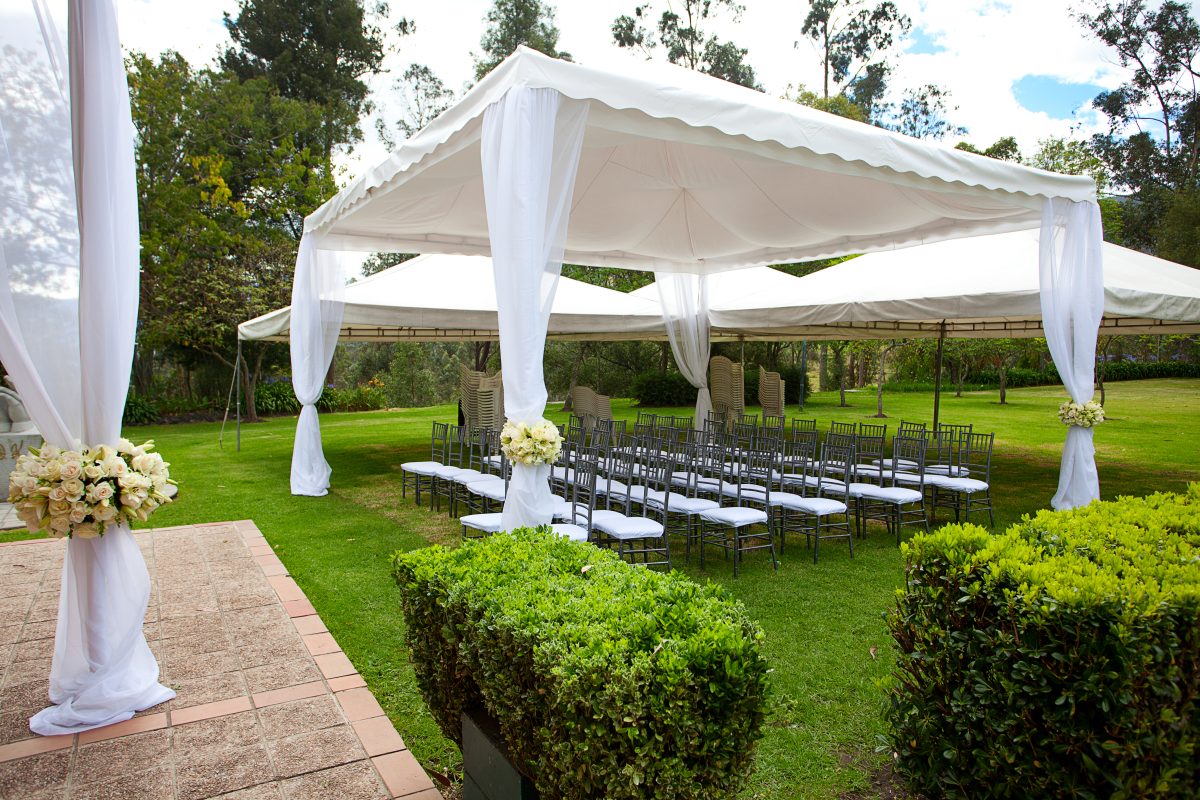 canopy tent with wedding seating draped scaled Gallery